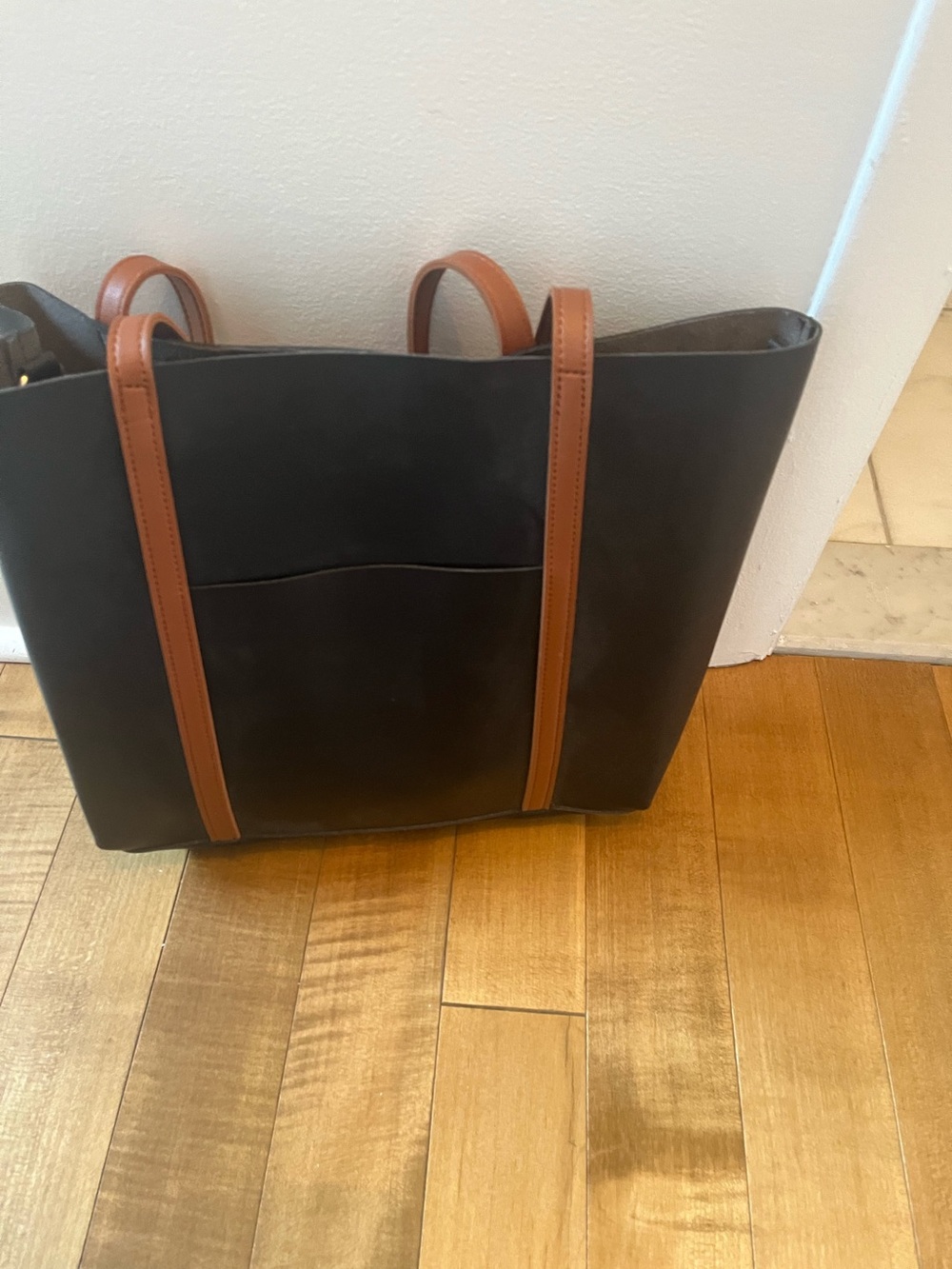 Classic Black and Brown Lionel leather purse with Straps.